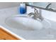 Close up of a bathroom sink with a marble countertop, and brushed nickel faucet at 158 Canopy Oak Ln, Statesville, NC 28625