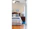 Bedroom featuring matching nightstand, soft blue accents, and abundant natural light at 158 Canopy Oak Ln, Statesville, NC 28625