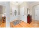 Inviting foyer featuring hardwood floors and classic decor at 158 Canopy Oak Ln, Statesville, NC 28625