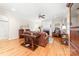 Warm living room with hardwood floors, fireplace, and classic furnishings at 158 Canopy Oak Ln, Statesville, NC 28625