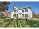 Expansive backyard with well-maintained lawn and a charming deck, ideal for entertaining at 18038 Greyfield Gln, Fort Mill, SC 29707