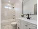 Bright bathroom featuring marble tile, modern fixtures, and a bathtub-shower combination at 18038 Greyfield Gln, Fort Mill, SC 29707