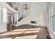 Stunning living room features tall ceilings, built-in shelving, and fireplace at 18038 Greyfield Gln, Fort Mill, SC 29707