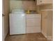 Practical laundry room has a standard washer and dryer set for simplified chores at 1814 Woods Ln, Denver, NC 28037