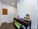 Bright entryway featuring dark wood floors, a modern console table, and crisp white trim at 2018 Sewall Sw Ave, Concord, NC 28025
