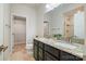 Elegant bathroom with double sink vanity, granite countertops, and a tiled shower for a luxurious experience at 224 Parkwood Ave, Charlotte, NC 28206