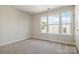 The carpeted bedroom is bright, with multiple windows letting in lots of light at 224 Parkwood Ave, Charlotte, NC 28206