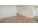 Bonus Room with hardwood floors, base molding, and stairs at 224 Parkwood Ave, Charlotte, NC 28206
