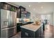 Gourmet kitchen featuring stainless steel appliances and spacious granite countertops at 224 Parkwood Ave, Charlotte, NC 28206