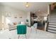 Inviting living room featuring neutral tones, stylish decor, and an open layout to the kitchen, perfect for entertaining at 224 Parkwood Ave, Charlotte, NC 28206