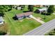 A stunning aerial view of the house and its big lush green yard in a peaceful neighborhood at 2430 Rocky Ford Rd, Newton, NC 28658