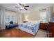 Comfortable bedroom with hardwood floors, natural light, and a cozy atmosphere at 2515 Sheffield Dr, Gastonia, NC 28054