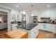 Modern kitchen with stainless steel appliances, granite counters, and a functional island at 2515 Sheffield Dr, Gastonia, NC 28054