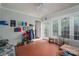 Charming sunroom with bright windows and playful decor, perfect for a playroom at 2515 Sheffield Dr, Gastonia, NC 28054