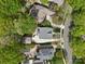 Aerial view of neighborhood homes showcasing landscaping, driveways, and mature trees at 2569 Lower Assembly Dr, Fort Mill, SC 29708