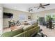 Spacious carpeted bedroom featuring a seating area, bed, ceiling fans, and a secure ProVault storage unit at 2569 Lower Assembly Dr, Fort Mill, SC 29708