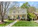 Charming two-story home featuring a welcoming front porch and a beautifully landscaped front yard at 2569 Lower Assembly Dr, Fort Mill, SC 29708