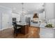 Well-lit kitchen with stainless steel appliances and an island with barstool seating at 2569 Lower Assembly Dr, Fort Mill, SC 29708