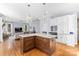 Open kitchen with island flows into the living area at 2569 Lower Assembly Dr, Fort Mill, SC 29708