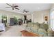 Spacious room features comfortable seating, table, mini kitchen and abundant natural light at 2569 Lower Assembly Dr, Fort Mill, SC 29708