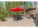 Outdoor living space features a patio with dining set, grill, and hot tub for relaxing and entertaining at 2569 Lower Assembly Dr, Fort Mill, SC 29708
