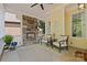 Relaxing porch with stone fireplace and cozy seating, perfect for enjoying outdoor living at 2569 Lower Assembly Dr, Fort Mill, SC 29708