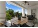 Relaxing balcony area with comfortable seating and a view of a quaint church steeple at 2823 Providence Rd # 143, Charlotte, NC 28211