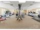 Well-equipped gym with various cardio machines and weight training equipment for a complete workout at 2823 Providence Rd # 143, Charlotte, NC 28211