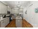 Bright kitchen featuring stainless steel appliances, granite countertops, and center island at 2823 Providence Rd # 143, Charlotte, NC 28211