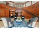 Expansive lobby featuring wood paneling, comfortable seating, and a grand staircase at 2823 Providence Rd # 143, Charlotte, NC 28211