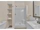 Updated bathroom with a standing shower, shelving, and modern fixtures at 319 Chestnut St, Rock Hill, SC 29730