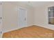 Empty bedroom with laminate flooring and a window at 319 Chestnut St, Rock Hill, SC 29730