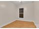 Bright empty bedroom with laminate flooring and a window at 319 Chestnut St, Rock Hill, SC 29730