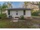 Exterior home view featuring white siding and manicured lawn at 319 Chestnut St, Rock Hill, SC 29730