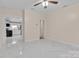 Open floorplan with bright living room and marble floors next to updated kitchen at 319 Chestnut St, Rock Hill, SC 29730