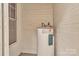 Water heater in a utility room at 319 Chestnut St, Rock Hill, SC 29730