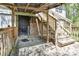 Wooden deck with stairs and railings, offering a view of the surrounding outdoor space at 322 Electra Ln, Stanley, NC 28164