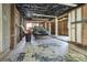 Spacious unfinished basement with car on lift, ready for customization and storage at 322 Electra Ln, Stanley, NC 28164