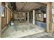 Unfinished basement with concrete floor and visible frame, offering potential for customization at 322 Electra Ln, Stanley, NC 28164