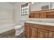 Bathroom featuring tub-shower, vanity and toilet at 322 Electra Ln, Stanley, NC 28164