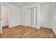 This bedroom offers wood-look floors, closet and an adjoining room at 322 Electra Ln, Stanley, NC 28164