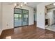 Dining area with hardwood floors, neutral walls and access to the screened in porch at 322 Electra Ln, Stanley, NC 28164