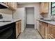 Kitchen with light wood cabinets, solid surface countertops, and stainless steel appliances at 322 Electra Ln, Stanley, NC 28164