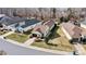 Aerial view of a charming home featuring a well manicured lawn and landscaping at 322 Flat Rock Dr, Denver, NC 28037