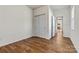 Bedroom with hardwood floors, closet, and doorways to other rooms at 322 Flat Rock Dr, Denver, NC 28037