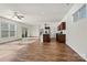 Spacious living area with wood floors and sliding doors to backyard at 322 Flat Rock Dr, Denver, NC 28037
