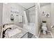 Bathroom with a double sink vanity, granite countertops, and a tiled shower-tub combination at 3224 Selwyn Farms Ln # 3, Charlotte, NC 28209