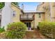 Rear view featuring patio seating, deck, and mature landscaping around this home at 3224 Selwyn Farms Ln # 3, Charlotte, NC 28209