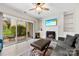 Inviting living room with fireplace, sliding glass doors to patio, and comfortable seating at 3224 Selwyn Farms Ln # 3, Charlotte, NC 28209