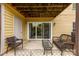 View of patio with furniture and sliding glass doors, great for enjoying the outdoors at 3224 Selwyn Farms Ln # 3, Charlotte, NC 28209
